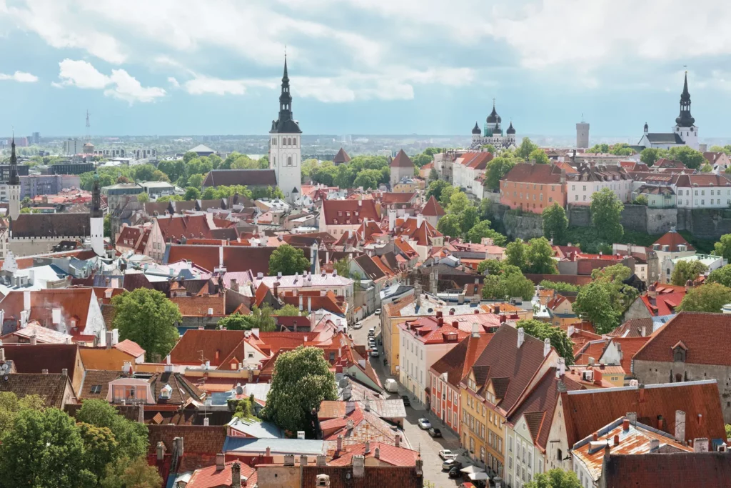 Digital Nomads Rejoice: The Best Citizenship and Residency by Investment Programs for Remote Workers in 2023 - Key Gains Immigration" showcases Estonia, one of the best countries for remote workers, offering a digital nomad visa and a favorable tax system.